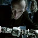 Jefferson (Julian Richings) and Carmen (Michelle Nolden) study the mysterious device.jpg