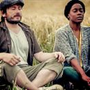 Hatter (James Fisher )and Sibonakaliso (Nayo Bonita) meditate in a formation.jpg